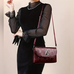 Gorgeous, classy multi texture Roses faux leather crossbody, new